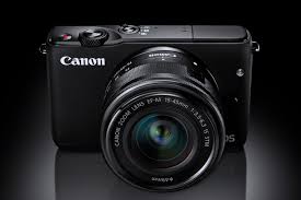 a black camera with a lens